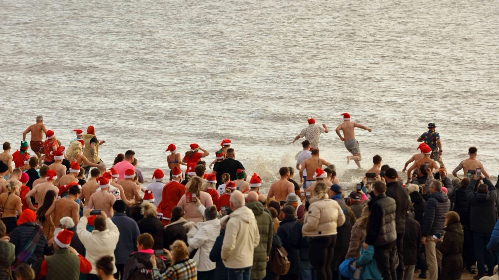 Bridlington Christmas Day Dippers brave the chilly North Sea to raise funds for charity