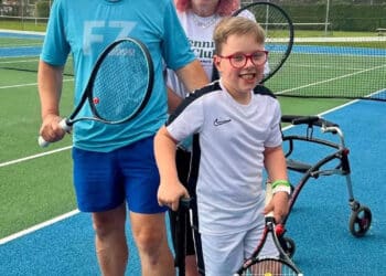 Henry at the Tennis Fundraiser with Paul and Jo Robinson.  Photo: Submitted